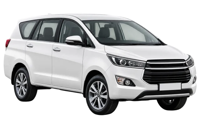 White Toyota Innova cab